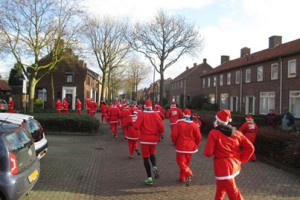 Kerstmannen PvdA Gilze en Rijen lopen Santa Run